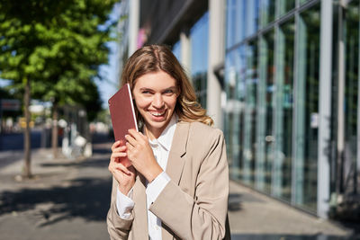 Young woman using mobile phone