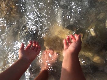 Legs of woman in water