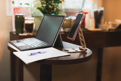 Close-up of laptop on table