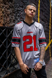 Portrait of young man standing outdoors