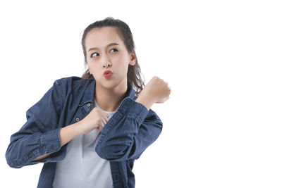 Portrait of a beautiful young woman over white background