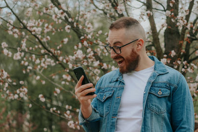 Young man using mobile phone