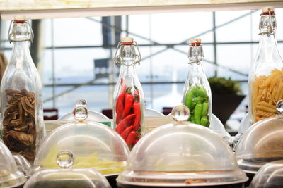 Close-up of wine bottles on table