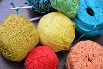 Close-up of colorful wool balls on table