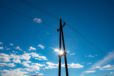 Low angle view of street light against sky