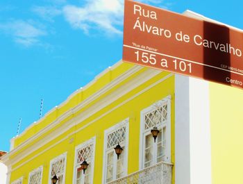 Low angle view of built structure against blue sky