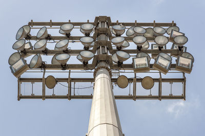 Low angle view of lighting equipment against sky