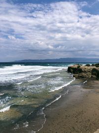 Scenic view of beach against sky