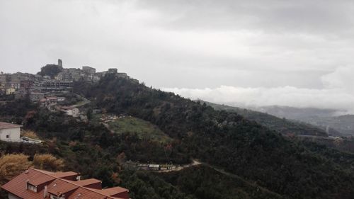 High angle view of residential district against sky