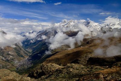 Scenic view of majestic mountains against sky