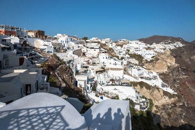 High angle view of town against clear sky during winter