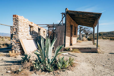 Abandoned built structure against clear sky