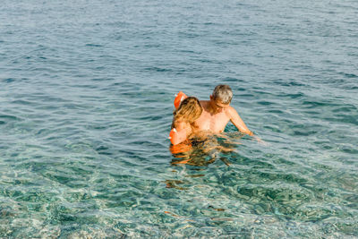 Man swimming in sea