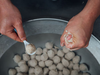 Close-up of person preparing food