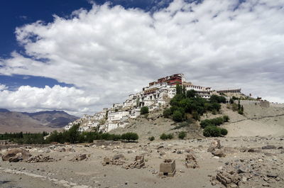 Old building against cloudy sky