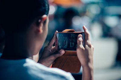 Portrait of man using mobile phone