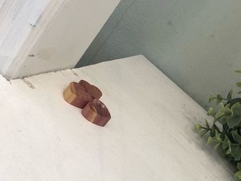 High angle view of bread on table against wall