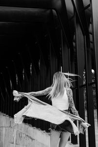 Young woman sitting in train
