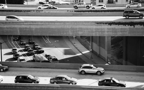 High angle view of cars on elevated road over highway