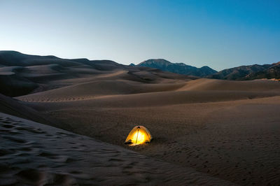 Scenic view of desert against sky