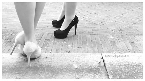 Low section of woman standing on floor