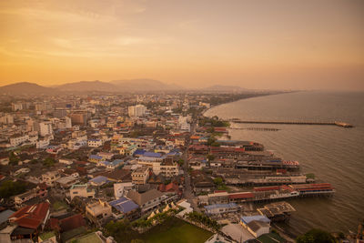 High angle view of city at sunset