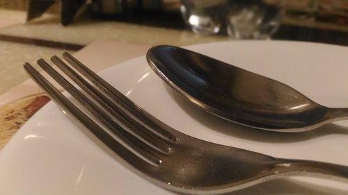 Close-up of empty plate on table