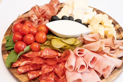 High angle view of chopped fruits in plate