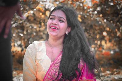 Portrait of a smiling young woman