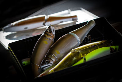 High angle view of fishing lure on table