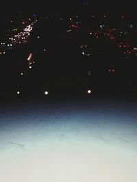 Close-up of multi colored lights against black background