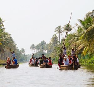 Tourists on boat in river