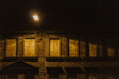 Low angle view of illuminated building at night