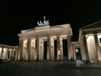 Low angle view of brandenburg gate at night