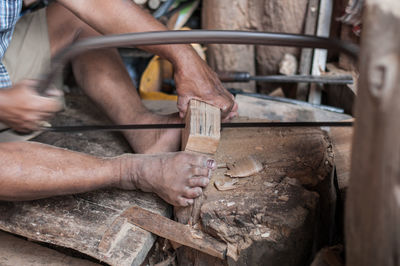 Man working on wood