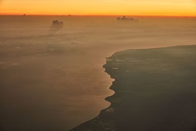 Scenic view of sunset over sea