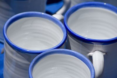 Close-up of ceramic cups for sale at market