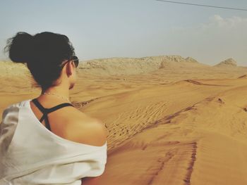 Woman looking at desert