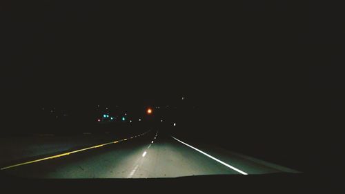 Cars on road at night