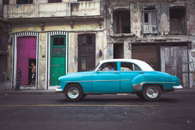 Vintage car parked at roadside