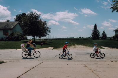 Bicycles riding bicycle against sky