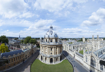 High angle view of buildings in city against sky