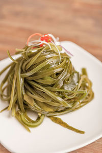 High angle view of pasta in plate on table