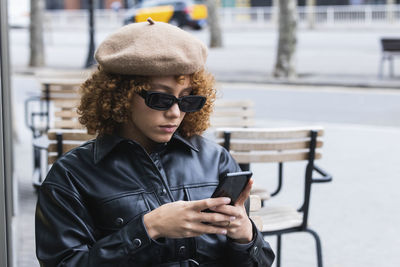 Young man using mobile phone