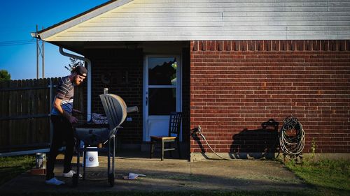 People sitting on table outside building