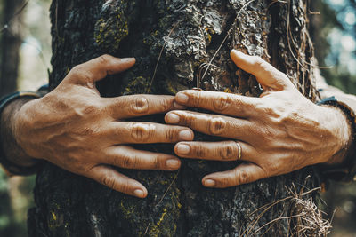 Cropped image of woman holding hands