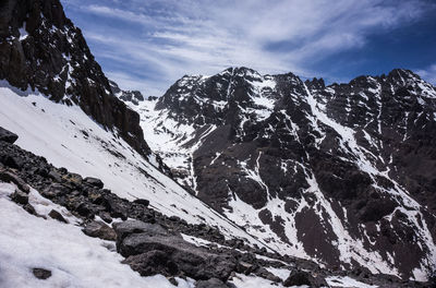 Snow covered mountains against sky