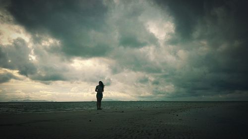 Silhouette of man on beach