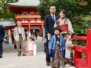 Full length of father and daughter in park