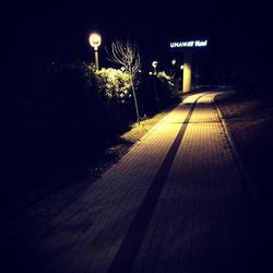 Illuminated street light at night
